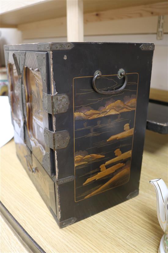 A Japanese lacquer cabinet on stand